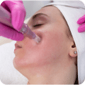 A close-up of a medical micro-needling procedure being performed on a patient's skin for rejuvenation and healing